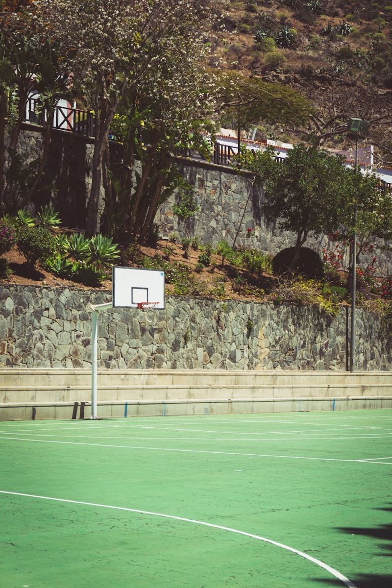 a basketball court with a sign